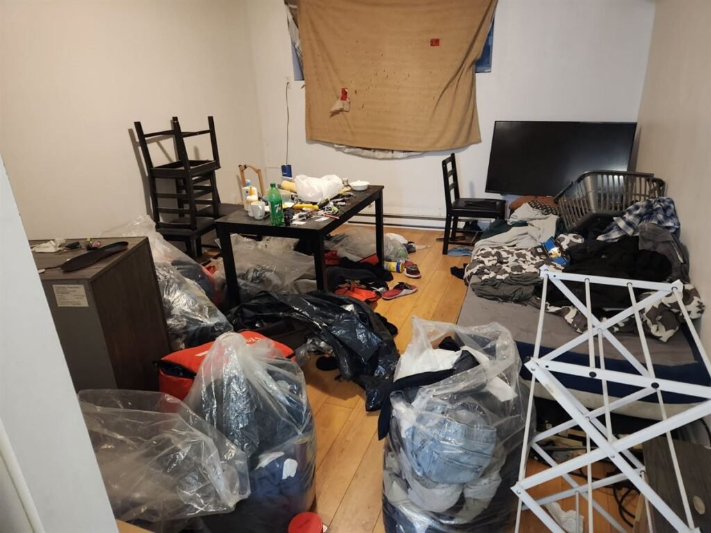 Apartment left full of belongings, bags and furniture after a tenant moved out