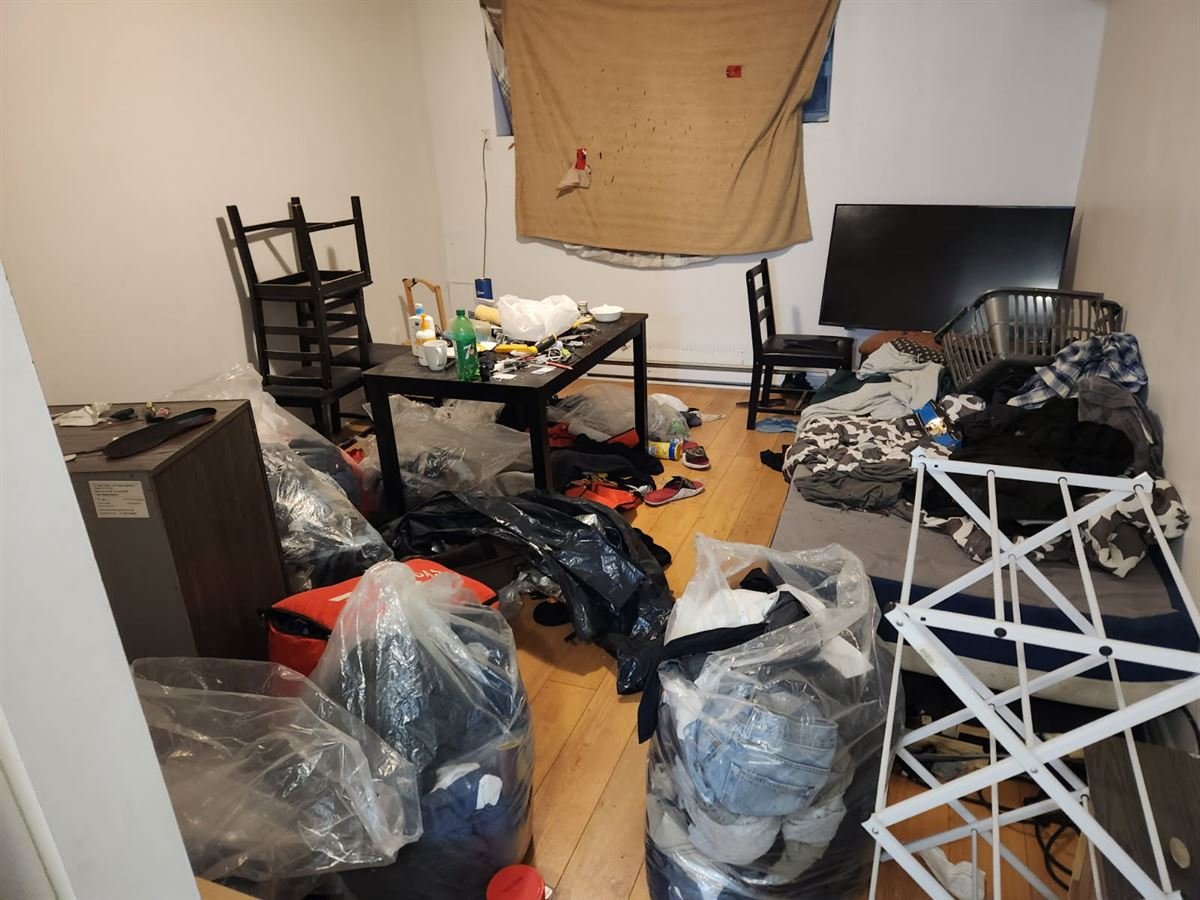 Apartment left full of belongings, bags and furniture after a tenant moved out